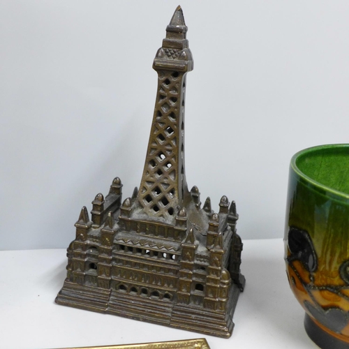 807 - A cast model Blackpool Tower money box, a carved bust, possibly Indian, a pair of pierced brass door... 