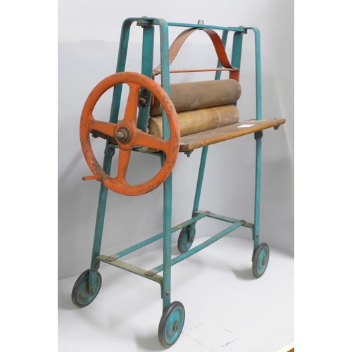 810 - A children's toy mangle