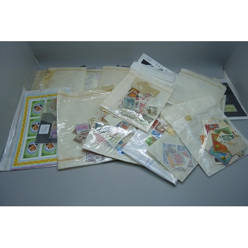 822 - A collection of stamps on stockcards and in packets