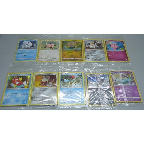 826 - 10 sealed Pokemon cards