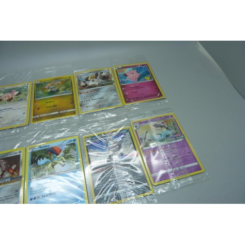 826 - 10 sealed Pokemon cards