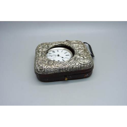 844 - A silver pocket watch in a silver mounted travel case, a/f, case lacking back stand, second hand loo... 