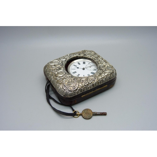 844 - A silver pocket watch in a silver mounted travel case, a/f, case lacking back stand, second hand loo... 