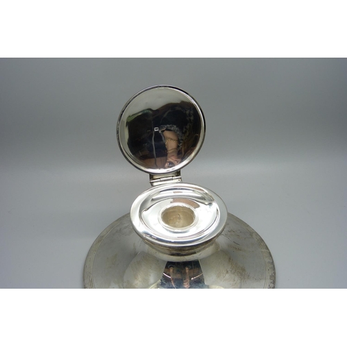 845 - A silver Capstan inkwell, Sheffield 1909, base 148mm