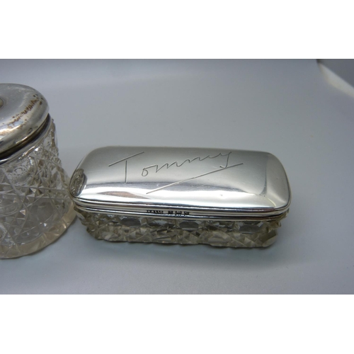 846 - Four silver top glass jars