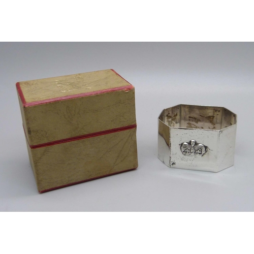 847 - An Elizabeth II 1952 commemorative silver napkin ring with crown detail, Birmingham 1952, Adie Bros.... 