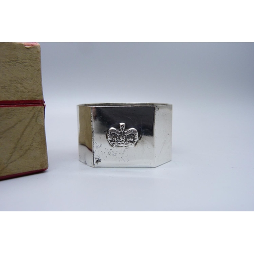 847 - An Elizabeth II 1952 commemorative silver napkin ring with crown detail, Birmingham 1952, Adie Bros.... 