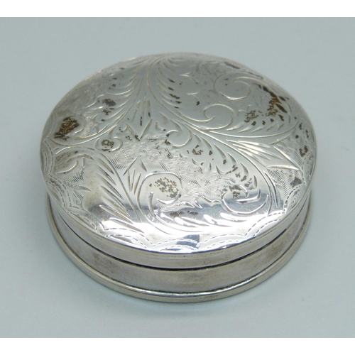 849 - An engraved circular silver box, 29g, 46mm