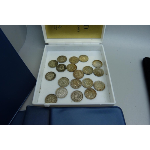 858 - A collection of British coins including half-crowns, commemorative coins, pre-1947 half-silver coins... 