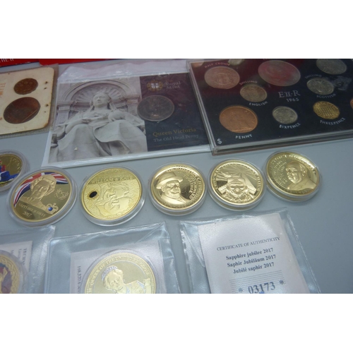 865 - A collection of commemorative coins including gold plated, 1965 British proof set, a Queen Victoria ... 