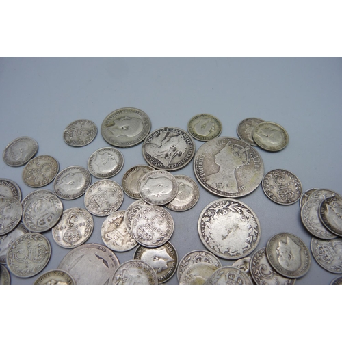 868 - A collection of silver coins including Victorian and 3d, 131g