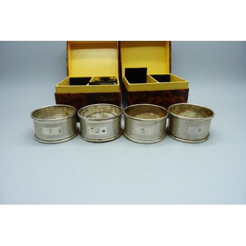 872 - A set of four silver napkin rings, numbered 1-4, Birmingham 1956, 48g