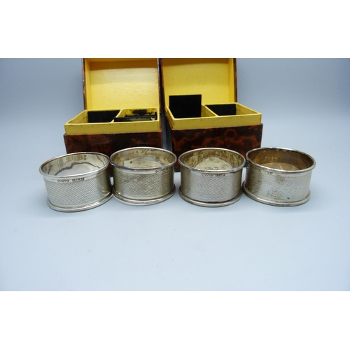 872 - A set of four silver napkin rings, numbered 1-4, Birmingham 1956, 48g