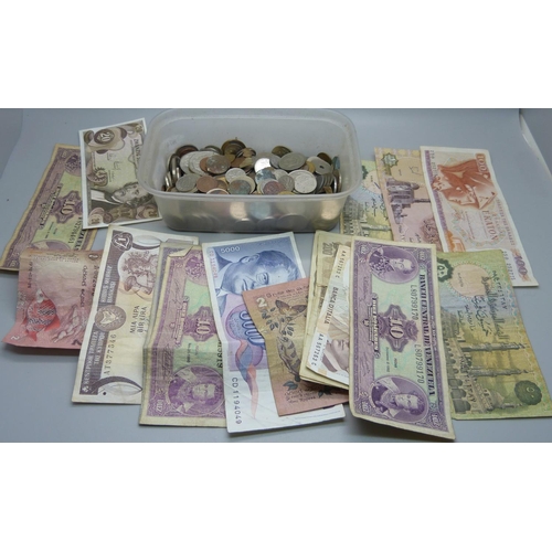 874 - A collection of coins and bank notes