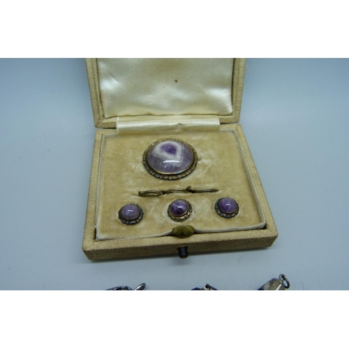 879 - A silver and Blue John brooch and button set, boxed, and three Blue John pendants