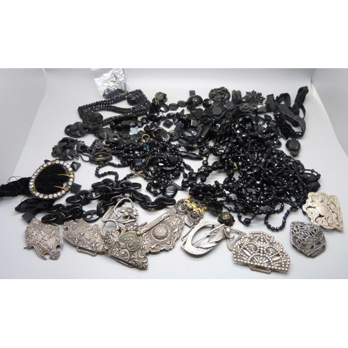 888 - A collection of jet jewellery, a horse hair chain, buckles, etc.