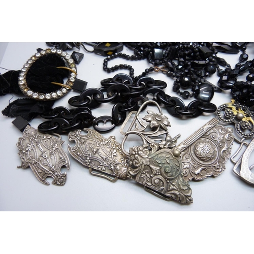 888 - A collection of jet jewellery, a horse hair chain, buckles, etc.