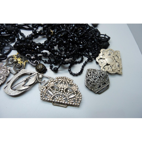 888 - A collection of jet jewellery, a horse hair chain, buckles, etc.