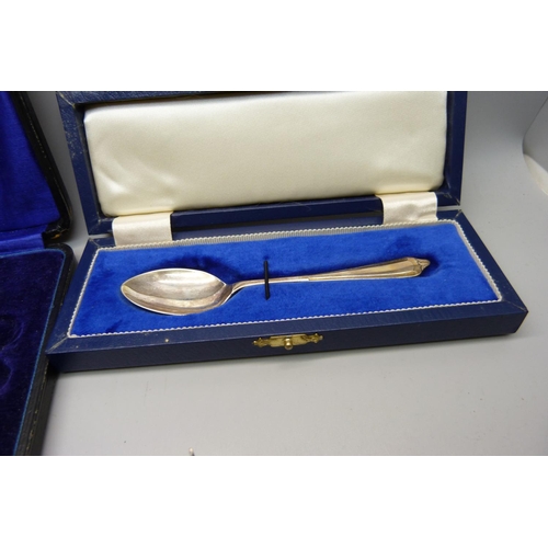 889 - A silver tooth fairy pot, a cased silver spoon, part manicure set and a letter opener with silver ha... 