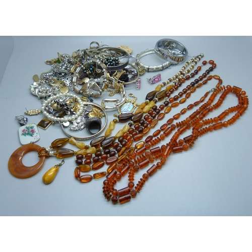 890 - A collection of amber jewellery and costume jewellery