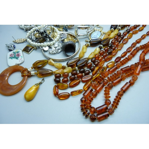 890 - A collection of amber jewellery and costume jewellery