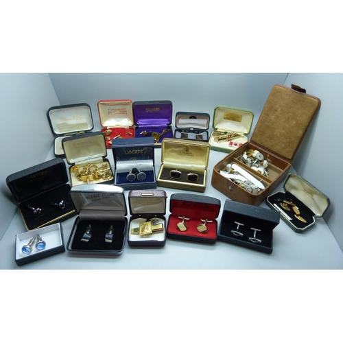 897 - A large collection of cufflinks and tie-pins