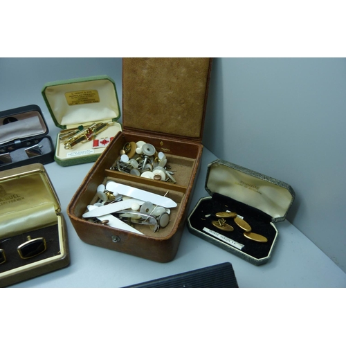 897 - A large collection of cufflinks and tie-pins