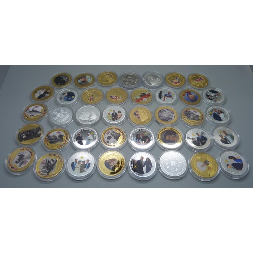 912 - Thirty-eight gold and silver plated medallions with enamel detailing, featuring military battles and... 