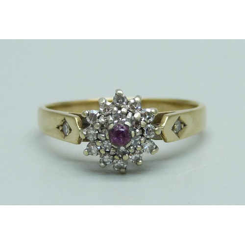 921 - A 9ct gold, ruby and diamond cluster ring, 2.1g, N