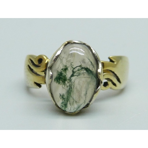 922 - A silver gilt and moss agate cabochon ring, O