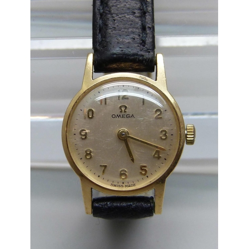 923 - A lady's 9ct gold cased Omega wristwatch