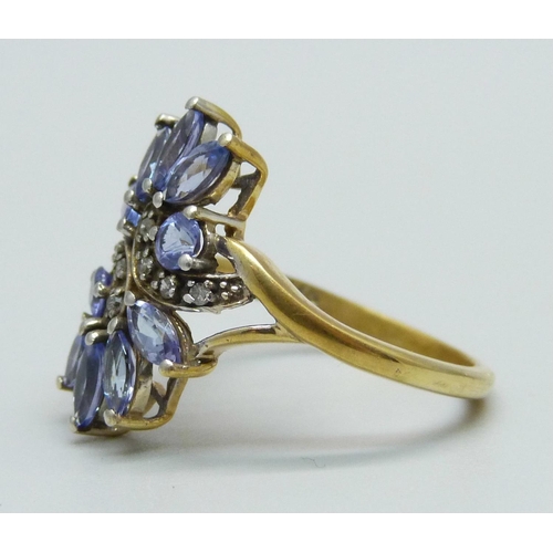 935 - A tanzanite and diamond cocktail cluster ring, marked 9K, 3.4g, O/P