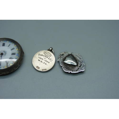 939 - A silver pocket watch, 4cm case, and two gold fronted silver fob medals