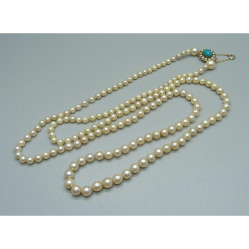 953 - A graduated pearl necklace with 9ct gold and turquoise clasp, 90cm