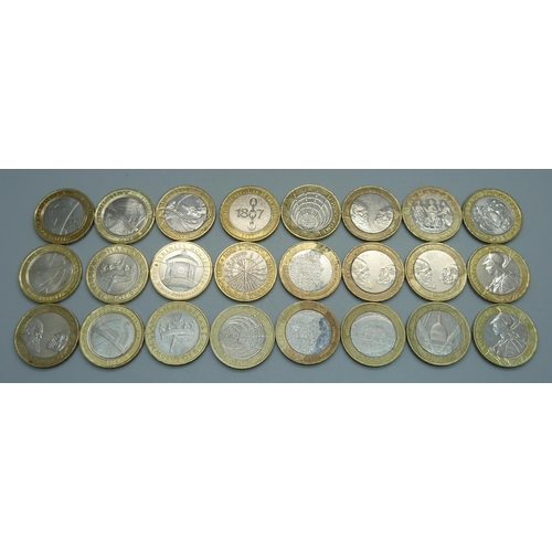 956 - Twenty-four collectable £2 coins including four Darwin, four WWI, two Shakespeare, etc.