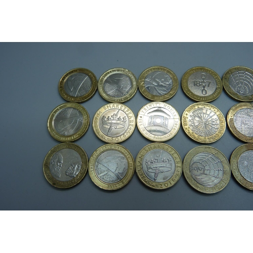 956 - Twenty-four collectable £2 coins including four Darwin, four WWI, two Shakespeare, etc.