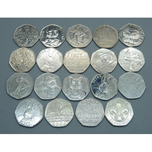 958 - Nineteen collectable 50p coins including eight Beatrix Potter, two Paddington, etc.