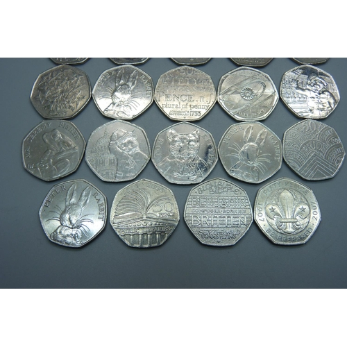 958 - Nineteen collectable 50p coins including eight Beatrix Potter, two Paddington, etc.