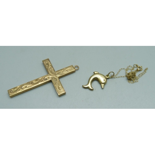 969 - A large 9ct gold cross pendant and a 9ct gold dolphin pendant and chain, 5.7g, cross 33 x 50mm