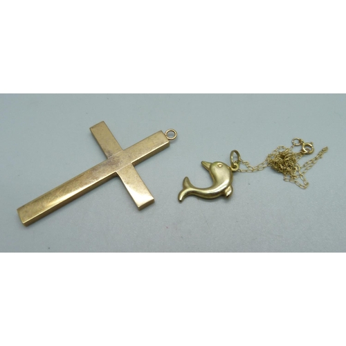 969 - A large 9ct gold cross pendant and a 9ct gold dolphin pendant and chain, 5.7g, cross 33 x 50mm