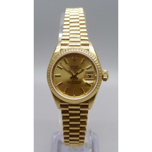 975 - A lady's 18ct gold Rolex Oyster-Perpetual Datejust wristwatch, President bracelet with crown clasp, ... 