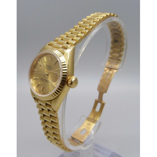 975 - A lady's 18ct gold Rolex Oyster-Perpetual Datejust wristwatch, President bracelet with crown clasp, ... 