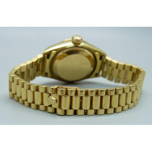 975 - A lady's 18ct gold Rolex Oyster-Perpetual Datejust wristwatch, President bracelet with crown clasp, ... 