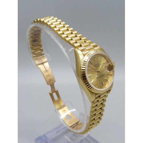 975 - A lady's 18ct gold Rolex Oyster-Perpetual Datejust wristwatch, President bracelet with crown clasp, ... 