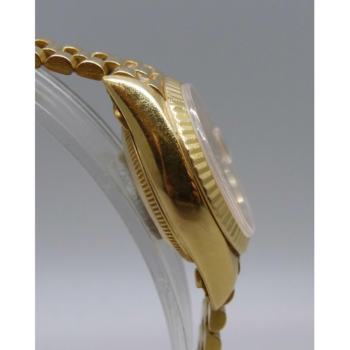 975 - A lady's 18ct gold Rolex Oyster-Perpetual Datejust wristwatch, President bracelet with crown clasp, ... 