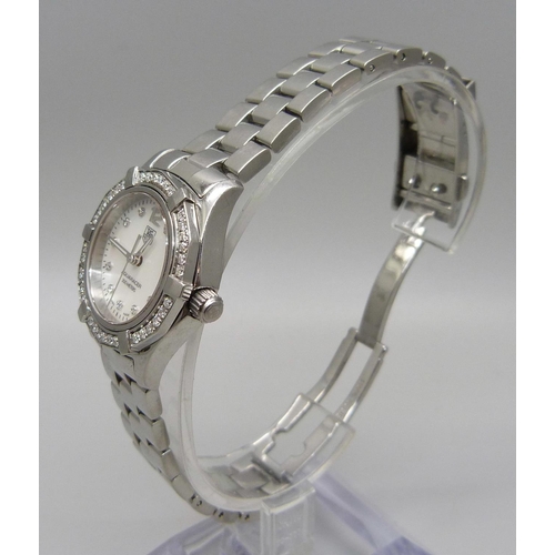 977 - A lady's Tag Heuer Aquaracer wristwatch set with 45 diamonds, approximately 0.55 carat diamond weigh... 