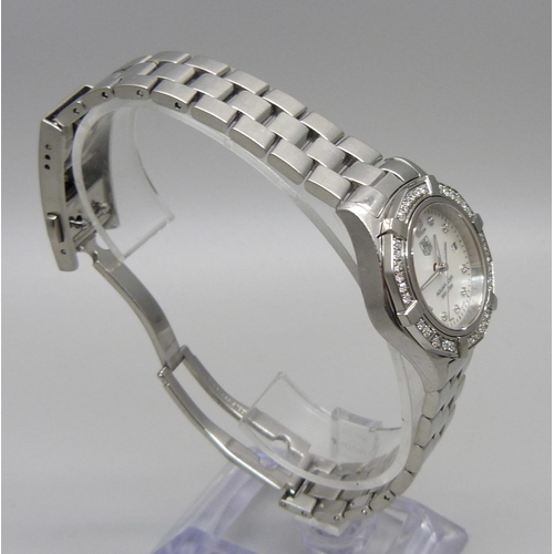 977 - A lady's Tag Heuer Aquaracer wristwatch set with 45 diamonds, approximately 0.55 carat diamond weigh... 