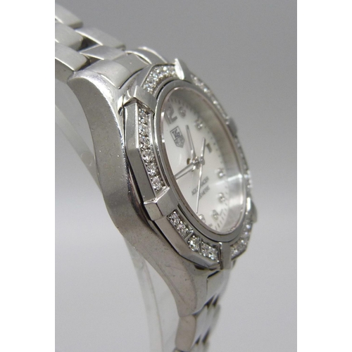 977 - A lady's Tag Heuer Aquaracer wristwatch set with 45 diamonds, approximately 0.55 carat diamond weigh... 