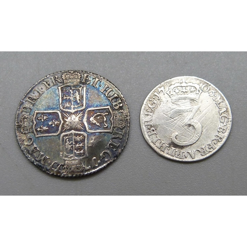 990 - A Queen Anne silver sixpence 1711 and a Queen Anne silver threepence 1706