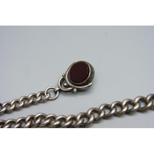 993 - A silver Albert chain, each graduated link marked, with a Victorian swivel fob dated Birmingham 1882... 